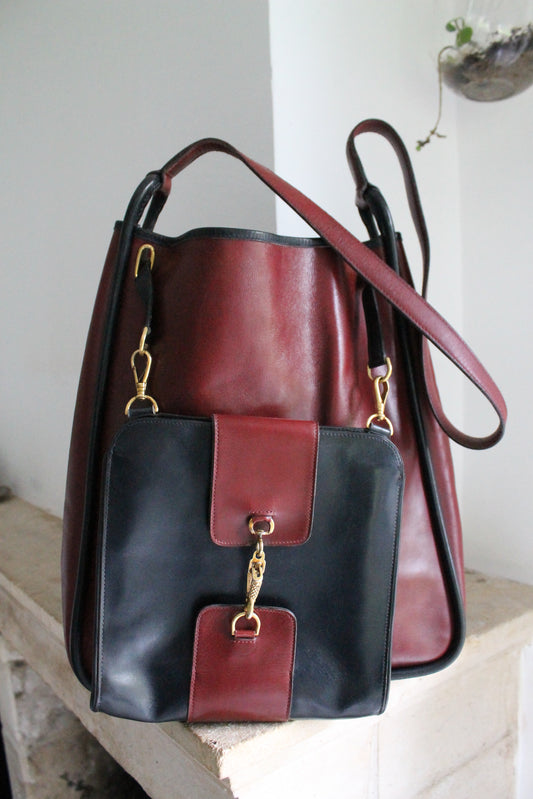 Hermès sac à main modèle The kilt en cuir bordeaux et noir