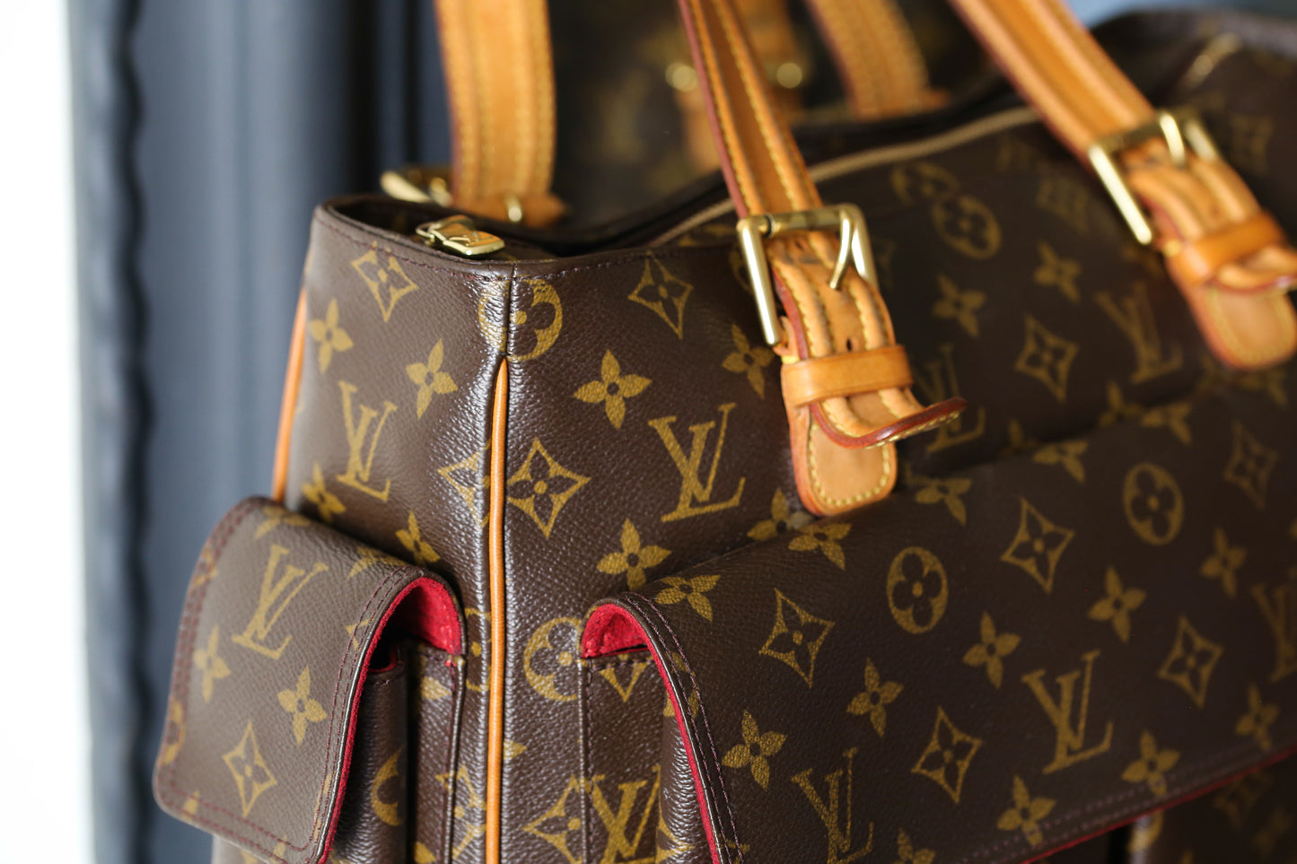 Louis Vuitton sac à main modèle multipli cité en toile et cuir
