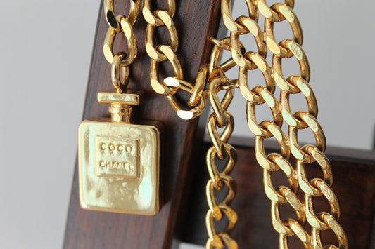 Chanel ceinture vintage en métal doré pendentif numéro 5