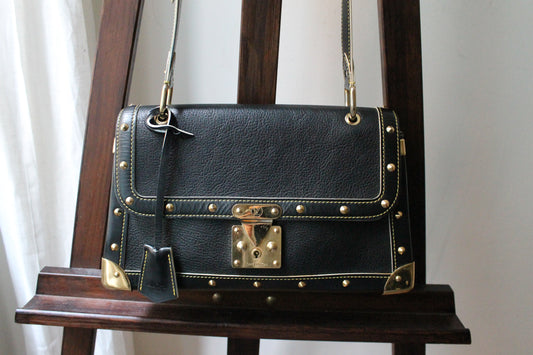 Louis Vuitton sac à main modèle Talentueux en cuir noir