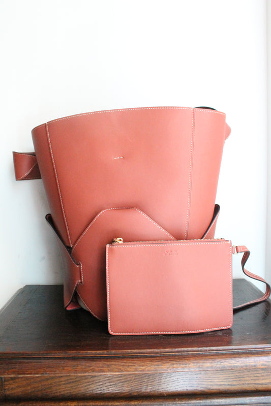 Sac seau Céline rose foncé en cuir et toile