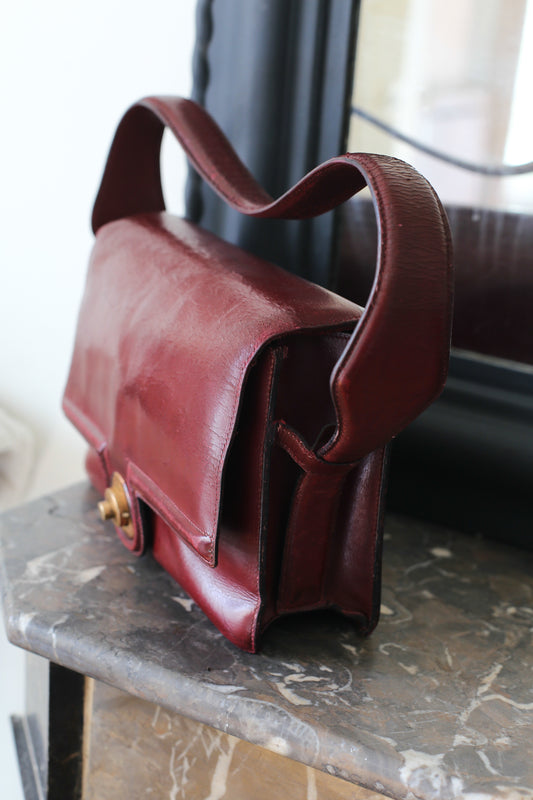 Hermès sac à main vintage modèle princesse en cuir bordeaux