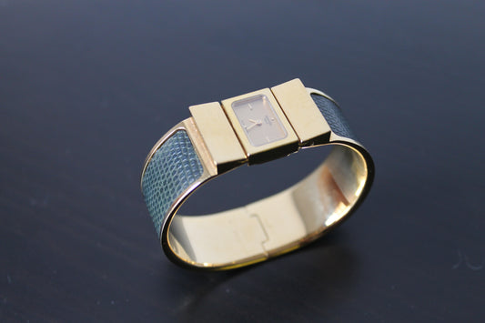 Hermès montre modèle loquet plaqué or