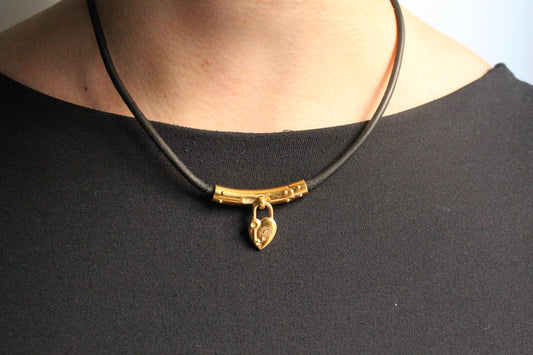 Hermès collier à breloque coeur cadenas plaqué or