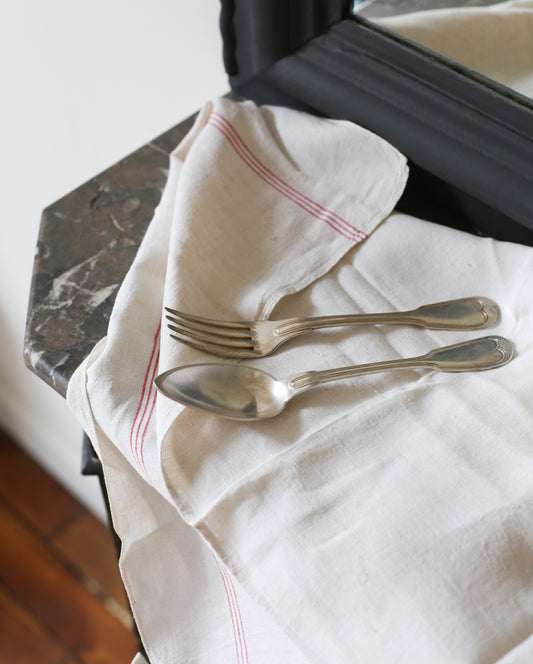 Deux couverts en métal argenté Christofle modèle filet début XXe siècle