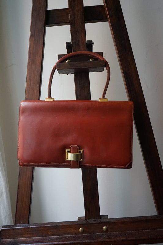 Hermès sac à main vintage modèle brio en cuir cognac