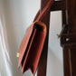 Hermès sac à main vintage modèle brio en cuir cognac