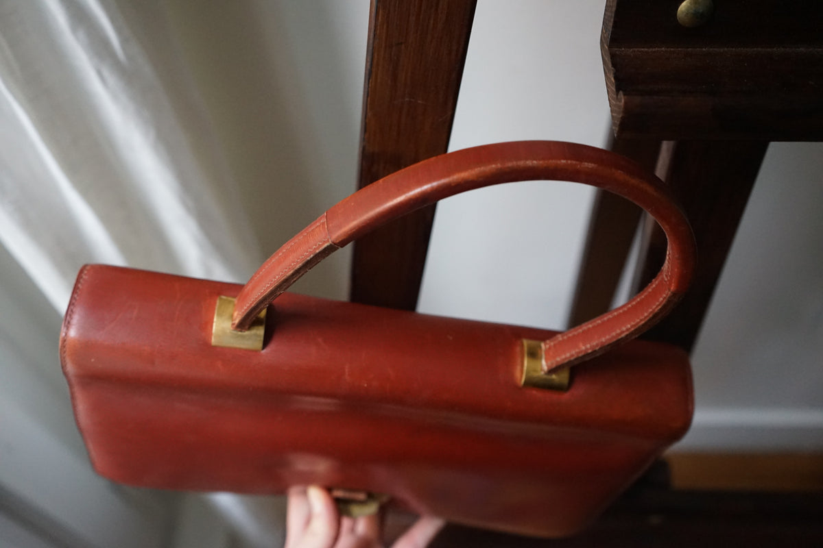 Hermès sac à main vintage modèle brio en cuir cognac