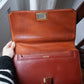 Hermès sac à main vintage modèle brio en cuir cognac