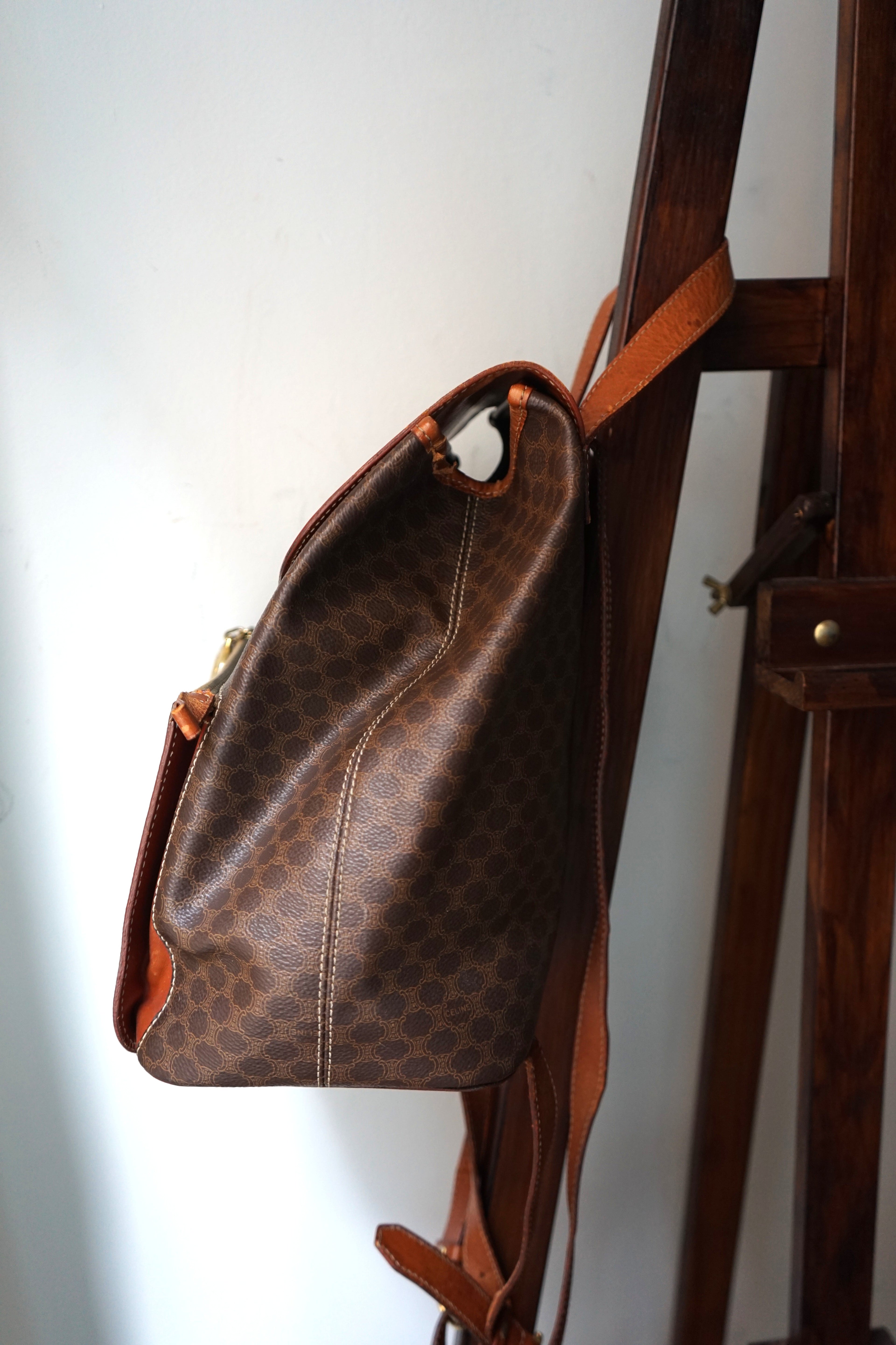 Céline sac à dos en cuir et toile triomphe