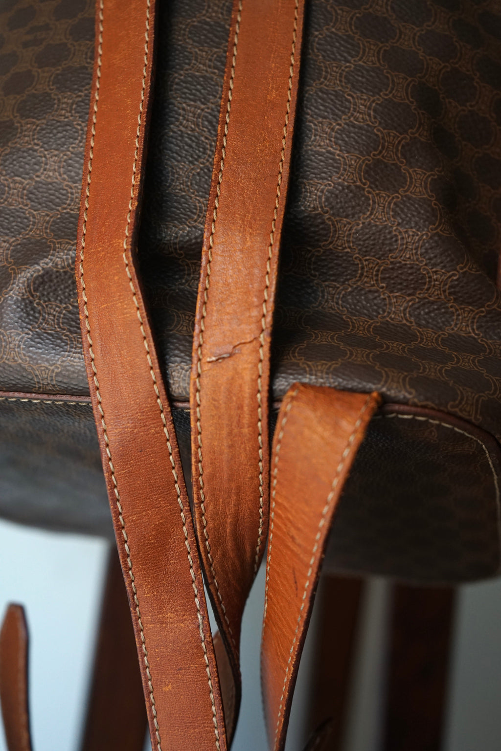 Céline sac à dos en cuir et toile triomphe