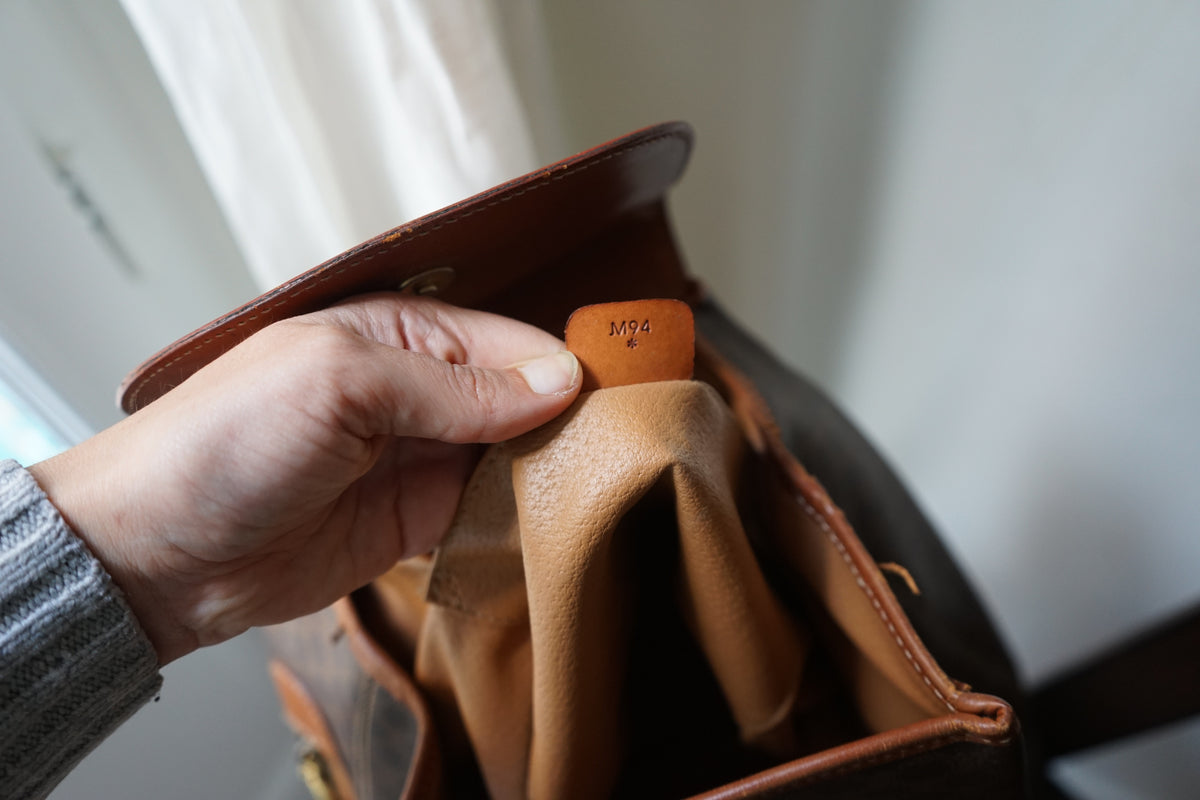 Céline sac à dos en cuir et toile triomphe