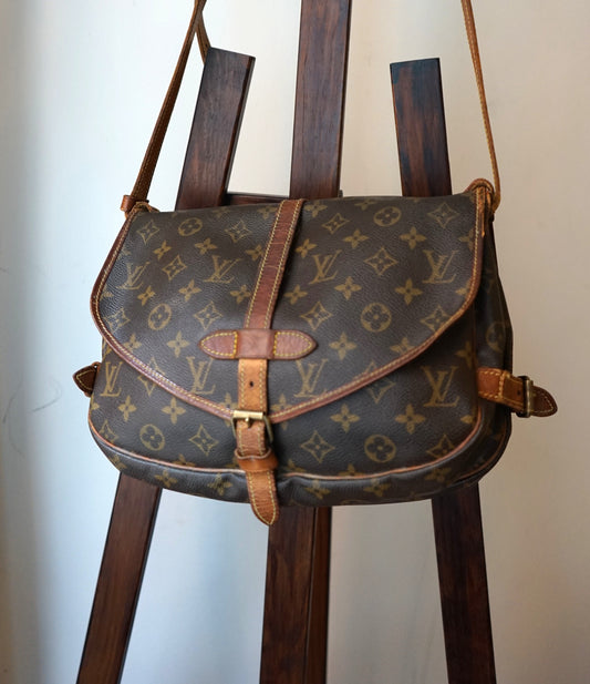Louis Vuitton sac à main modèle Saumur en toile et cuir