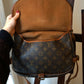 Louis Vuitton sac à main modèle Saumur en toile et cuir