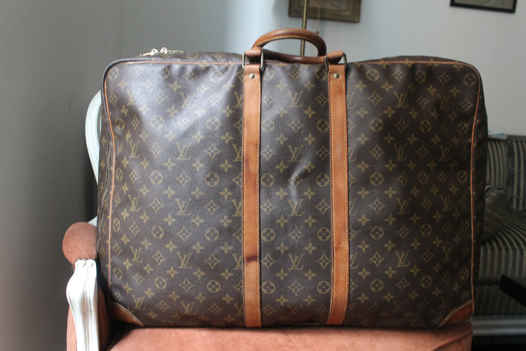 Louis Vuitton valise modèle Sirius en toile monogram et cuir