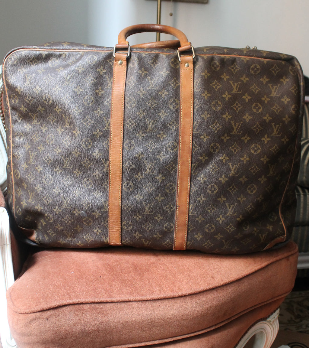 Louis Vuitton valise modèle Sirius en toile monogram et cuir