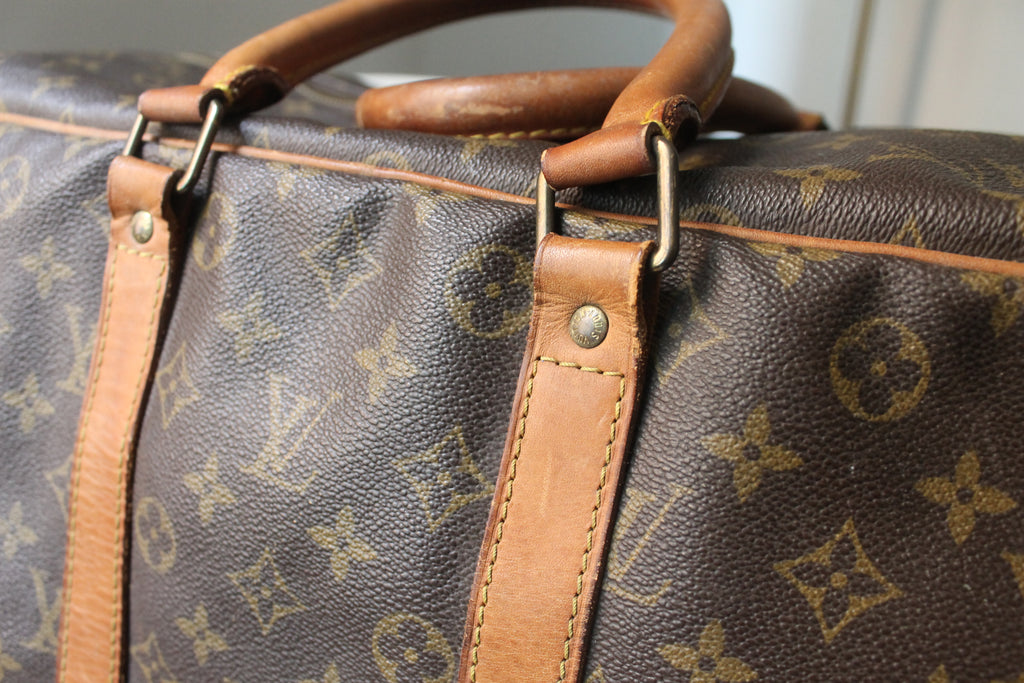 Louis Vuitton valise modèle Sirius en toile monogram et cuir