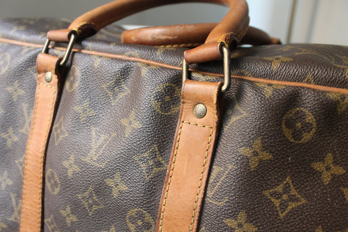 Louis Vuitton valise modèle Sirius en toile monogram et cuir