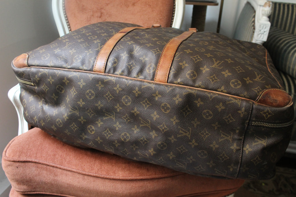 Louis Vuitton valise modèle Sirius en toile monogram et cuir