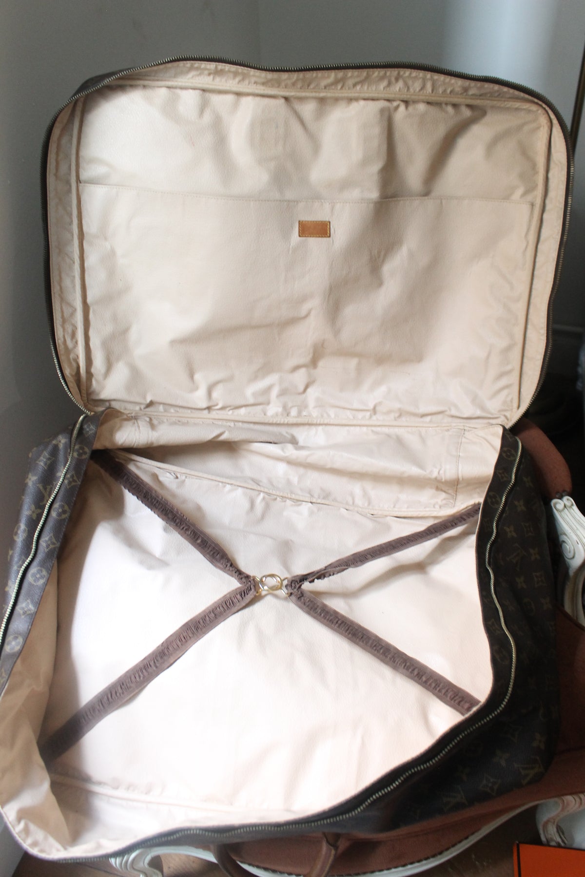 Louis Vuitton valise modèle Sirius en toile monogram et cuir