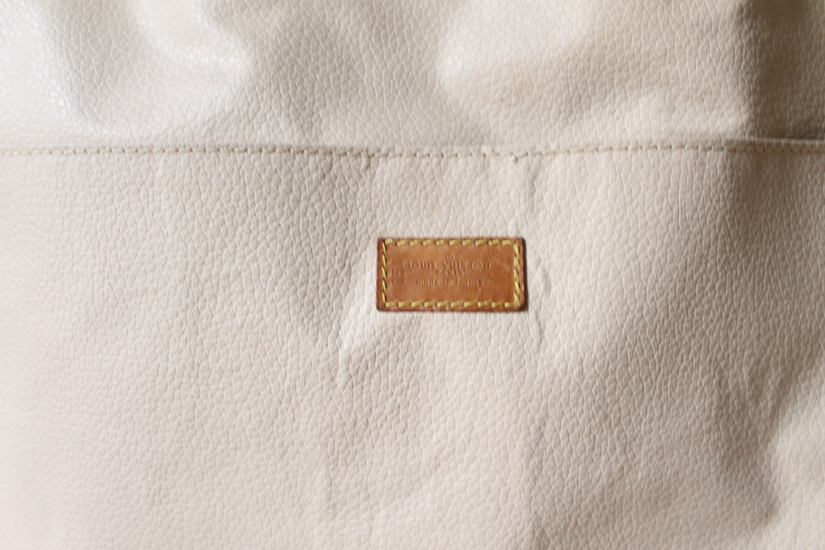 Louis Vuitton valise modèle Sirius en toile monogram et cuir
