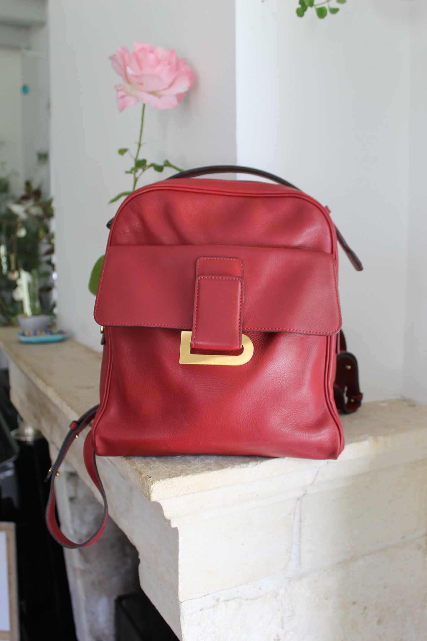 Delvaux sac à dos en cuir grainé rouge avec son dustbag