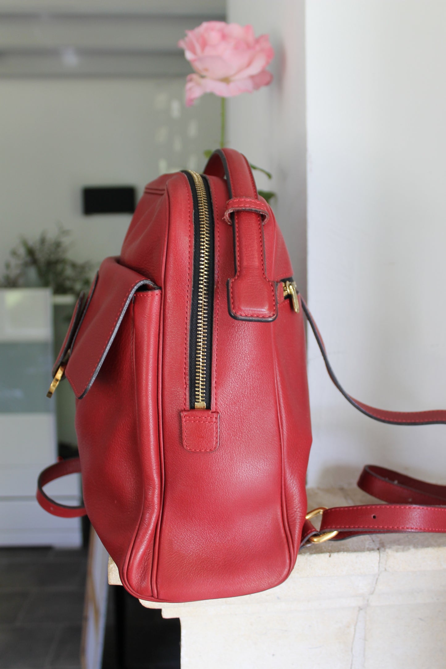 Delvaux sac à dos en cuir grainé rouge avec son dustbag