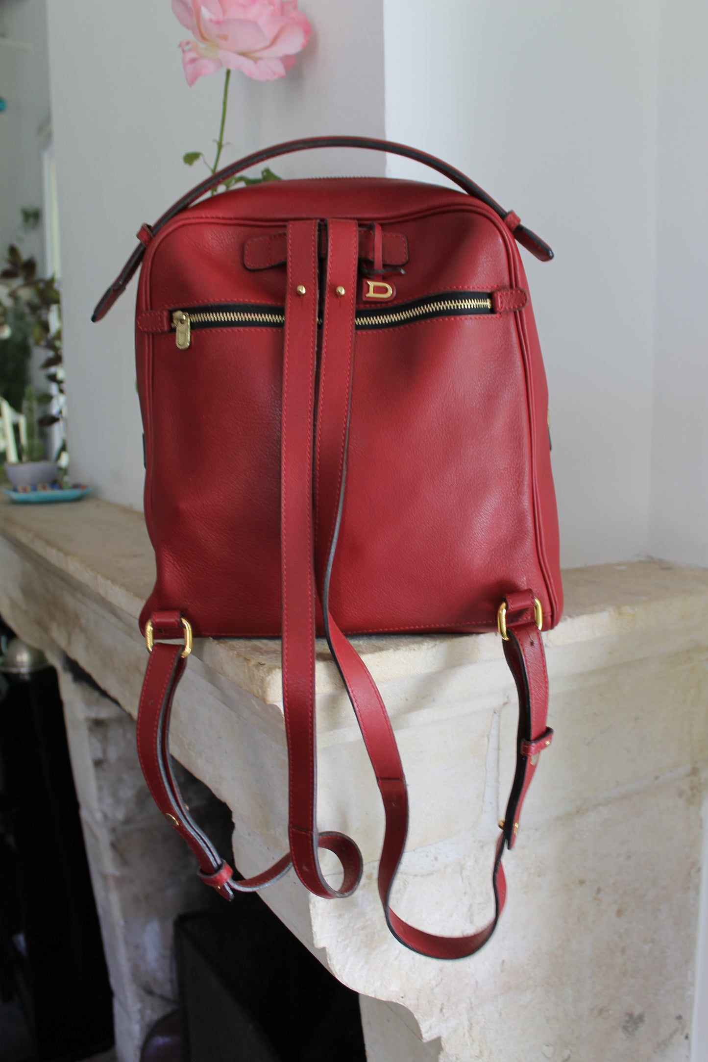 Delvaux sac à dos en cuir grainé rouge avec son dustbag