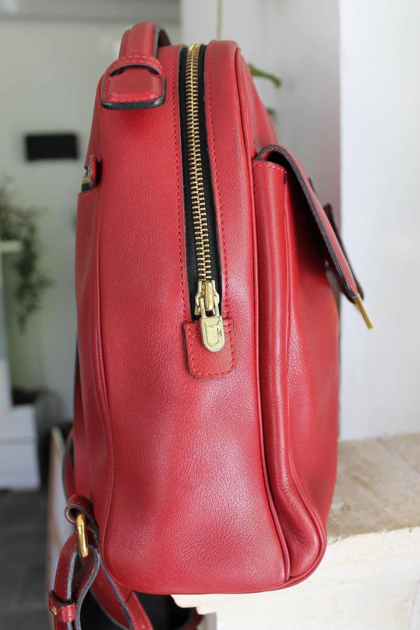 Delvaux sac à dos en cuir grainé rouge avec son dustbag