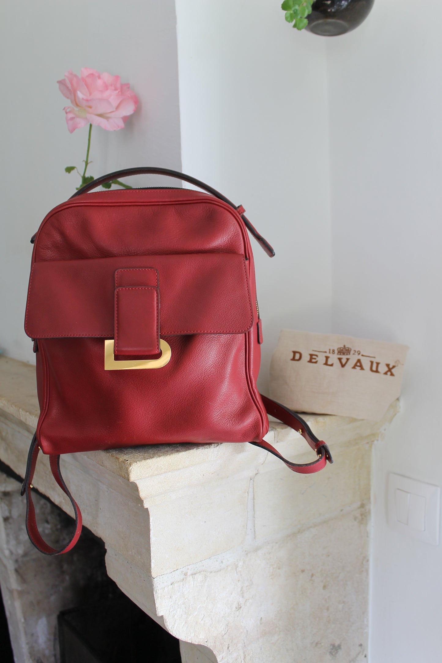 Delvaux sac à dos en cuir grainé rouge avec son dustbag