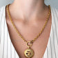 Chanel collier en métal doré double CC