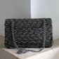 Chanel sac à main modèle Timeless en tweed et cuir