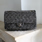 Chanel sac à main modèle Timeless en tweed et cuir