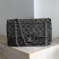 Chanel sac à main modèle Timeless en tweed et cuir