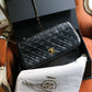 Chanel sac à main modèle Timeless en cuir noir vintage
