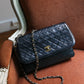 Chanel sac à main modèle Timeless en cuir noir vintage