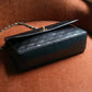 Chanel sac à main modèle Timeless en cuir noir vintage
