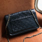 Chanel sac à main modèle Timeless en cuir noir vintage