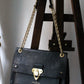 Louis Vuitton sac à main modèle Vavin en cuir noir