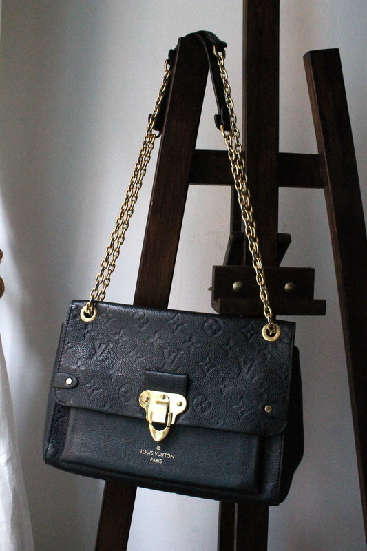 Louis Vuitton sac à main modèle Vavin en cuir noir