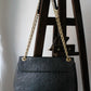 Louis Vuitton sac à main modèle Vavin en cuir noir