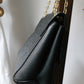 Louis Vuitton sac à main modèle Vavin en cuir noir