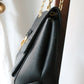 Louis Vuitton sac à main modèle Vavin en cuir noir