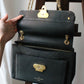 Louis Vuitton sac à main modèle Vavin en cuir noir