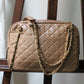 Chanel sac à main modèle Caméra en cuir beige