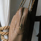 Chanel sac à main modèle Caméra en cuir beige