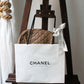 Chanel sac à main modèle Caméra en cuir beige