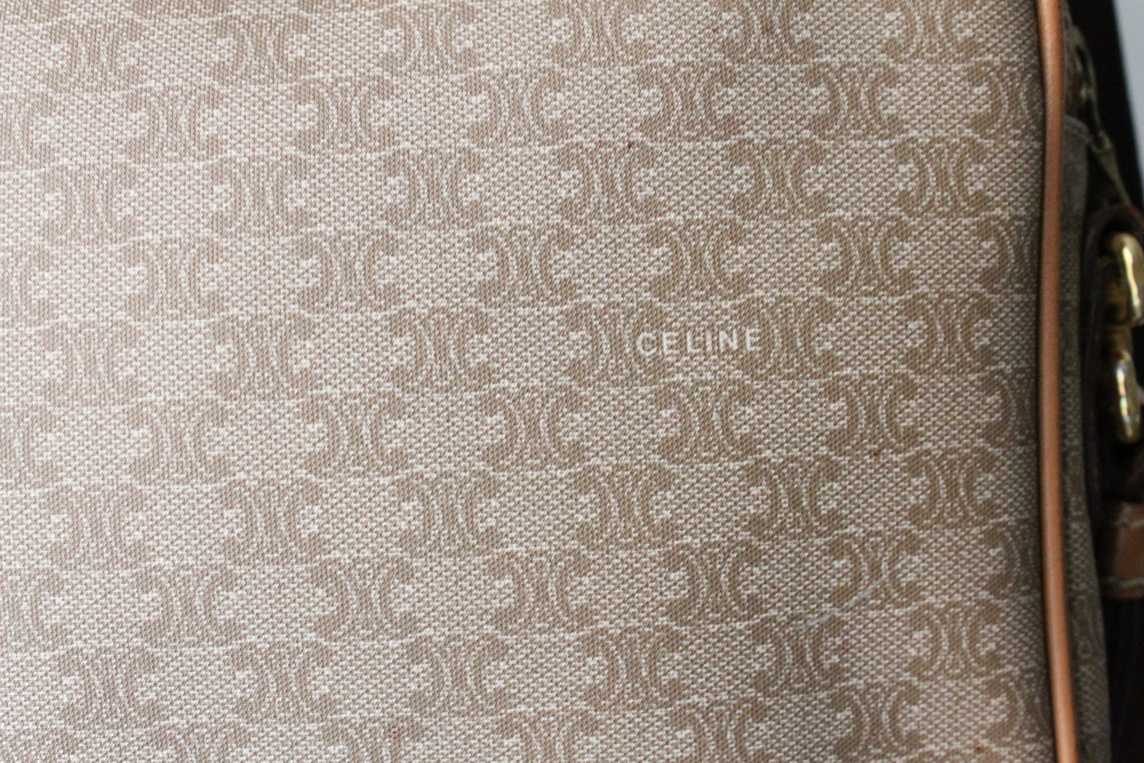 Céline pochette en toile et cuir motif triomphe