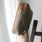 Céline pochette en toile et cuir motif triomphe