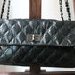 Chanel sac à main modèle 2.55 en cuir craquelé glacé